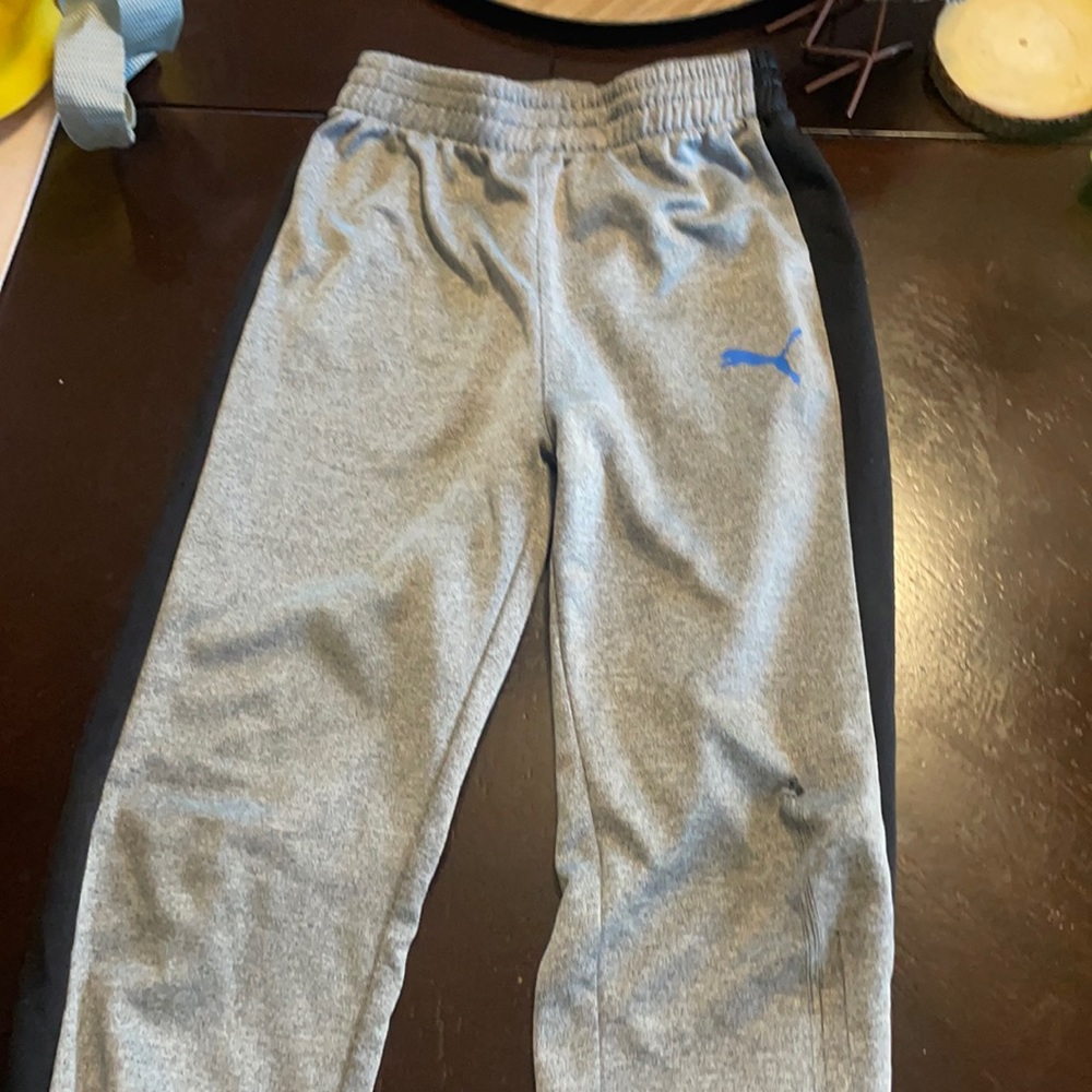 TWO Puma pairs of sweat pants